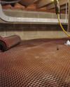Crawl space drainage matting installed in a home in Modesto