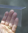Closeup of a clear plastic covering on a Santa Ana crawl space block wall