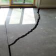 a huge crack in a concrete slab floor in San Jose