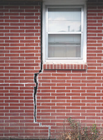 severe foundation wall cracks along a window in Santa Clarita