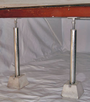Crawl space jack posts installed in conjunction with a crawl space vapor barrier in Rancho Cucamonga