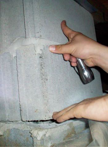 a completely failing concrete crawl space support pillar in Oceanside