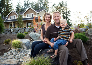 A happy family outside a home with a repaired foundation in Garden Grove