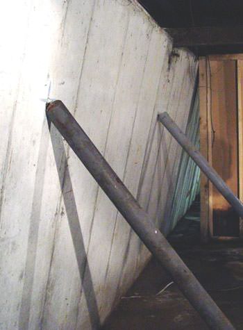 A foundation wall leaning in at the top in Lancaster