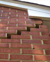 Serious damage to a foundation wall due to settlement of a home in Fontana