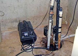 Pedestal sump pump system installed in a home in Irvine